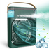A portable humidifier with a green color scheme, featuring a fan and a handle on top. 